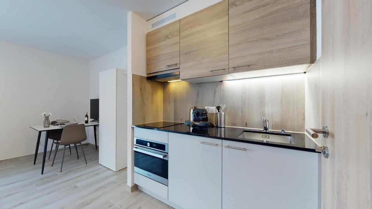 Nonanteneuf Appart Hotel Aigle - Contactless Check-In Экстерьер фото